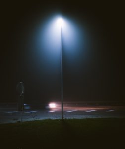 Solar-powered LED street lighting poles installed along a highway in UAE
